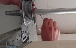 Adjusting a garage door drum