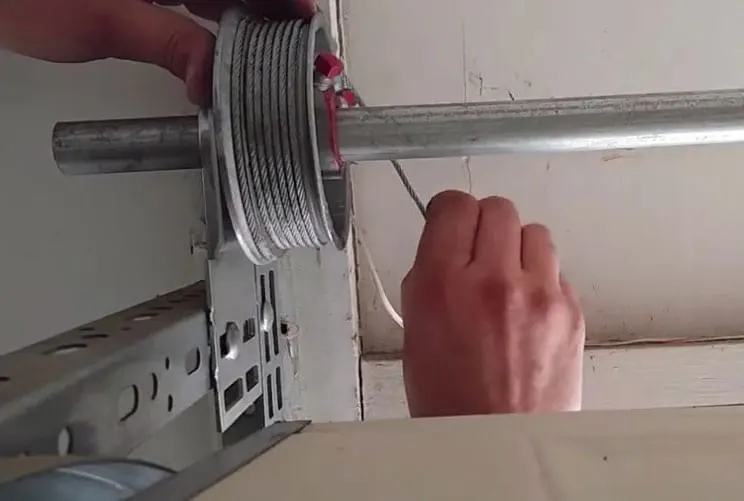 Adjusting a garage door drum