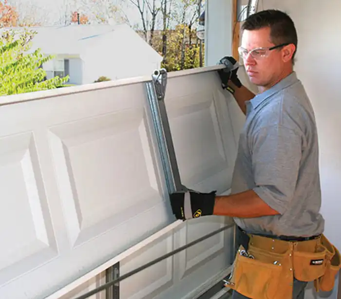 Installing garage door panels